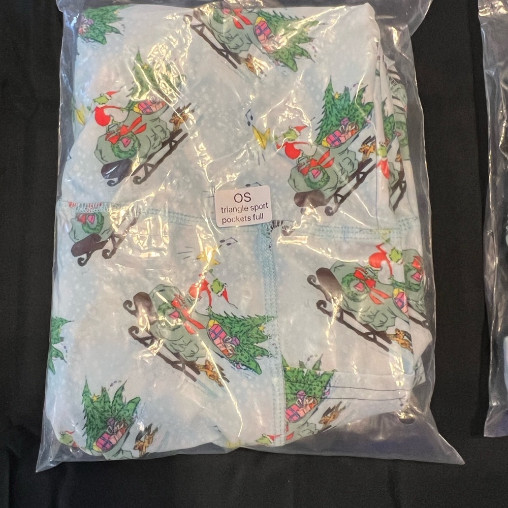 Spread the Holiday Cheer wearing a pair of The Grinch Leggings! - Picture 6 of 6
